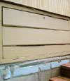 an old-fashioned crawl space door in Yarmouth about to be replaced