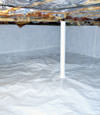 A sealed crawl space in Dieppe with a vapor barrier
