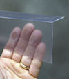 Closeup of a clear plastic covering on a Riverview crawl space block wall