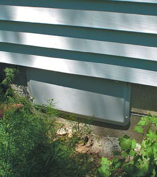 A gray crawl space vent cover in Bridgewater