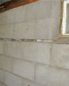Severely buckling foundation walls in a home in Kentville in need of repairs.