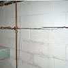 Severe foundation damage from a long crack in a bucking wall of a Saint John home.