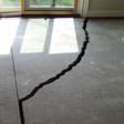 a huge crack in a concrete slab floor in Fredericton