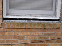 A window sill cracking and separating from the foundation wall in a Sun City West home.