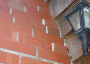a repaired chimney in Bridgewater that had shown serious foundation damage and was repaired with a helical pier system.