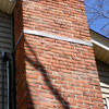 A tilting chimney on a North Sydney home with a leaning, tilting chimney that was temporarily repaired.