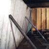 Temporary foundation wall supports stabilizing a Charlottetown home