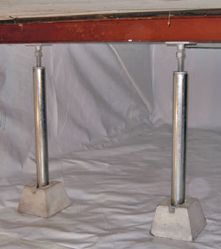 Crawl space jack posts installed in conjunction with a crawl space vapor barrier in Antigonish