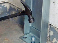 Mounting a foundation channel anchor installation to the floor in Dieppe.