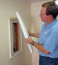 wall anchor covers installed in a foundation repair for a Miramichi home.