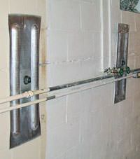 A foundation wall anchor system used to repair a basement wall in Quispamsis