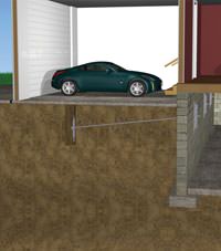 A street creep repair system implementing foundation wall anchors in a Quispamsis home.
