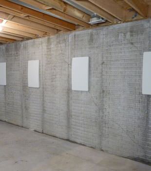Wall anchor covers covering a foundation wall repair system in Riverview, Lower Sackville, New Glasgow, Saint John, Bedford, Bridgewater, Amherst