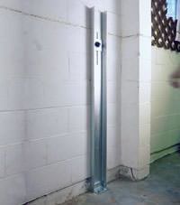 A failing foundation wall repaired with a foundation wall channel anchor system in a Charlottetown home.