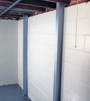 A PowerBrace™ i-beam foundation wall repair system in Moncton
