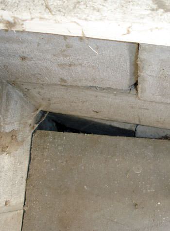 inward rotation of a foundation wall damaged by street creep in a garage in New Waterford
