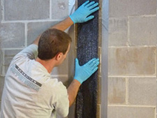 CarbonArmor® Strip applied to wall in Truro