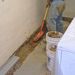 Digging a trench for a French Drain system in Moncton
