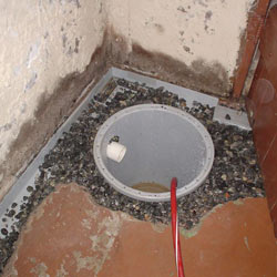 Installing a sump in a sump pump liner in a Fredericton home