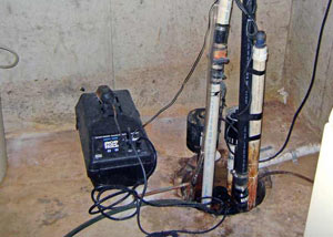 Pedestal sump pump system installed in a home in Bedford