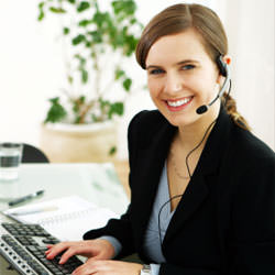 A disaster restoration customer service expert in Charlottetown manning the phones