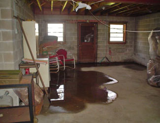 a flooded basement floor in a Shediac home