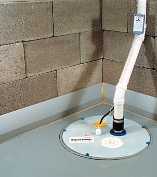 A baseboard basement drain pipe system installed in Riverview