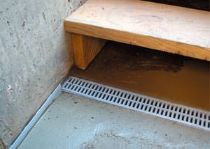 a hatchway entrance in Miramichi that has been protected from flooding by our TrenchDrain basement drainage system.