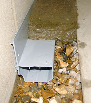 A basement drain system installed in a Dieppe home