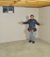 Dieppe basement insulation covered by EverLast™ wall paneling, with SilverGlo™ insulation underneath